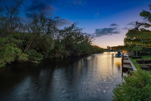 property view of water with a dock