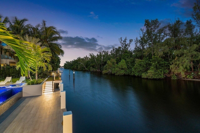 view of dock with a water view