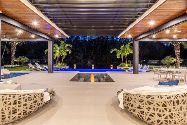 view of swimming pool featuring a pergola and a patio area