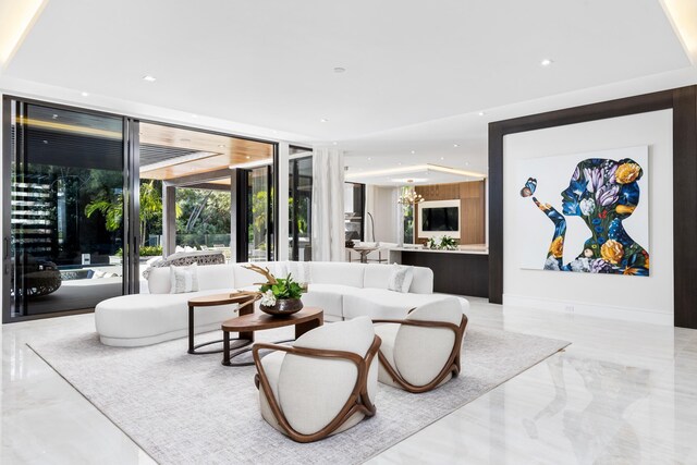 living room featuring an inviting chandelier