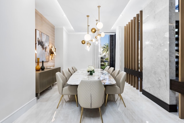 dining space with a notable chandelier