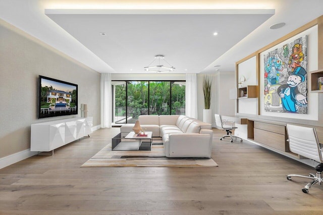 living room with light hardwood / wood-style flooring