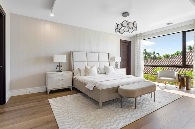 bedroom featuring hardwood / wood-style floors