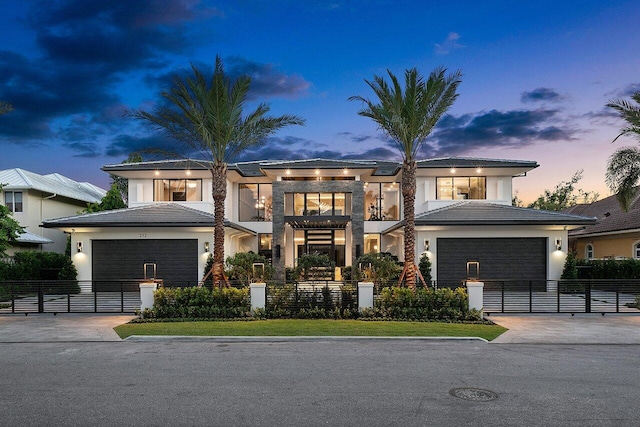 view of front of property featuring a garage