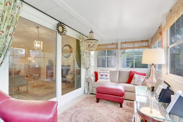 sunroom with a notable chandelier