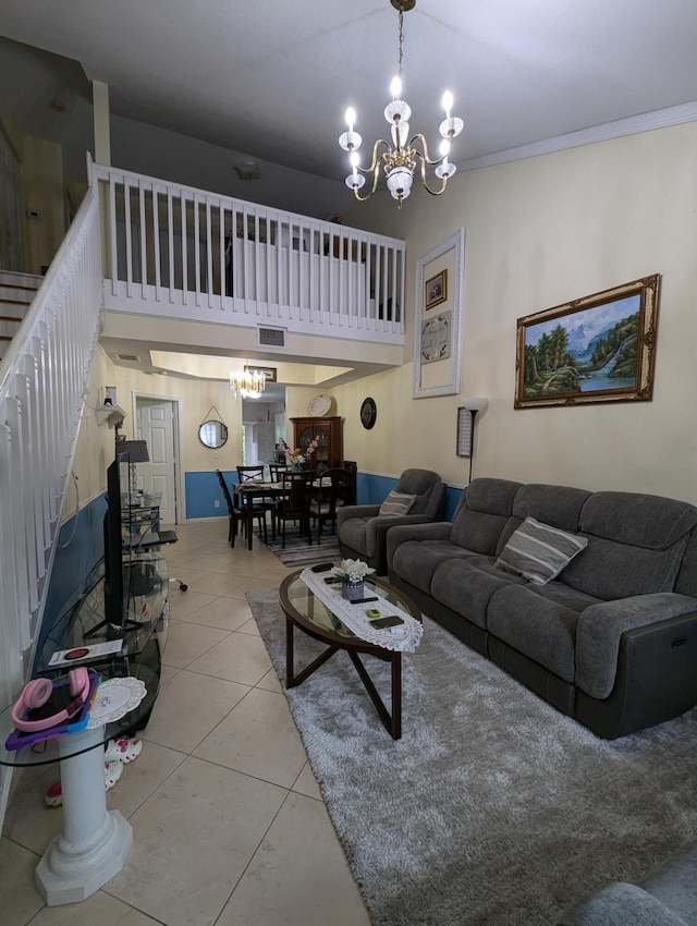 living room featuring light tile patterned floors and a notable chandelier