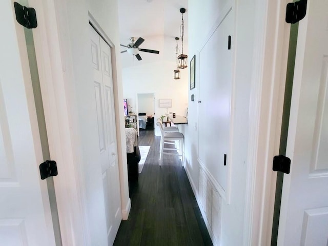 hallway with dark hardwood / wood-style floors