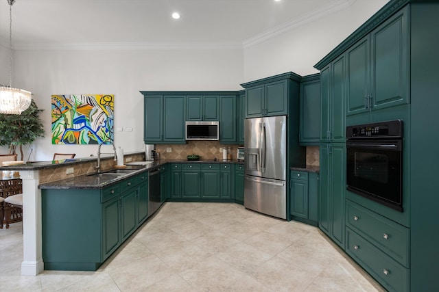 kitchen featuring crown molding, decorative light fixtures, sink, stainless steel appliances, and kitchen peninsula