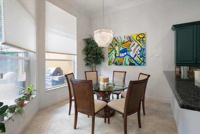 dining room with light tile patterned floors, crown molding, and a chandelier