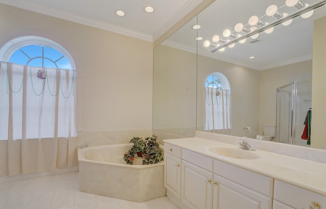 full bathroom with vanity, separate shower and tub, ornamental molding, toilet, and tile patterned floors