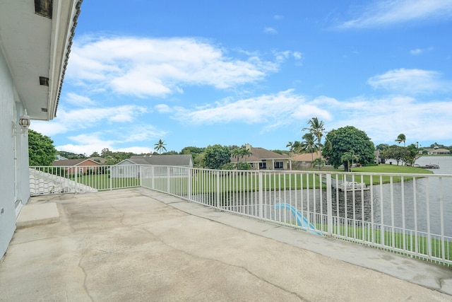 view of patio featuring a water view