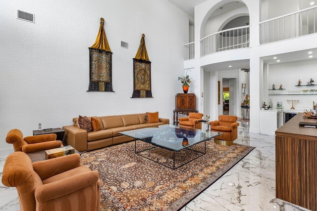 living room with a high ceiling