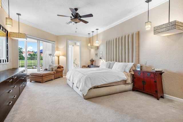 carpeted bedroom with ceiling fan, a textured ceiling, crown molding, and access to outside