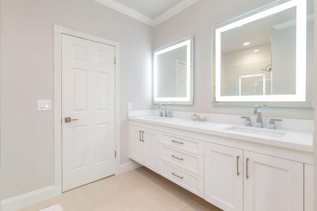 bathroom with vanity and ornamental molding