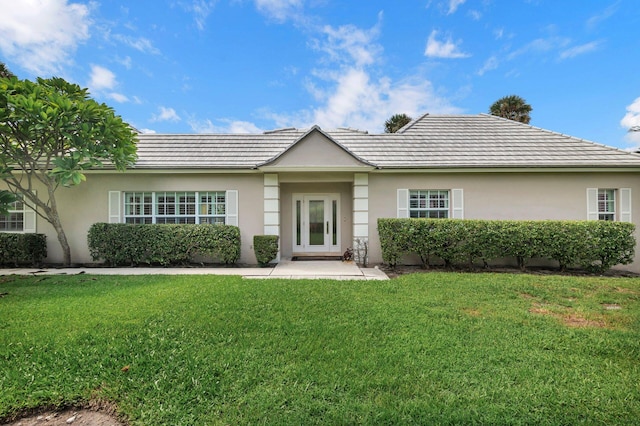 view of front of home with a front yard