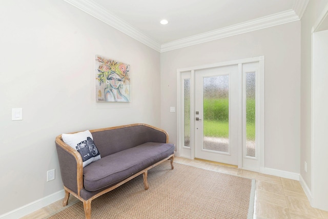 sitting room featuring ornamental molding