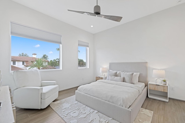 bedroom featuring ceiling fan and light wood-type flooring