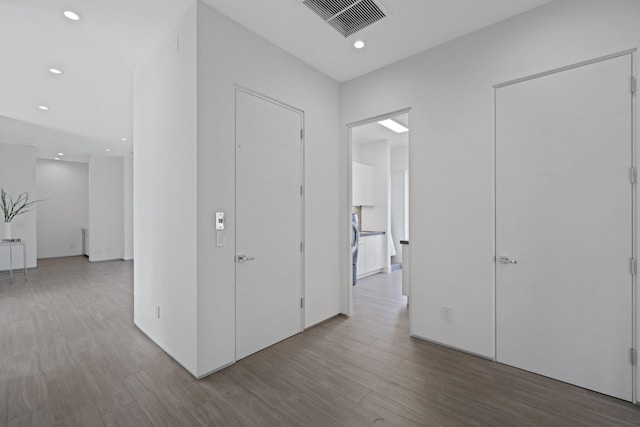 hall featuring hardwood / wood-style floors