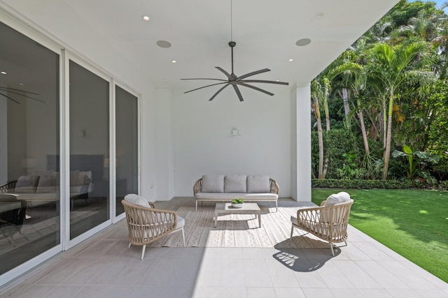 view of patio with ceiling fan and an outdoor living space