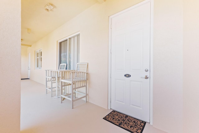 entrance to property with covered porch