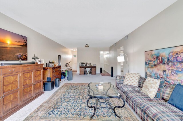 living room featuring light colored carpet