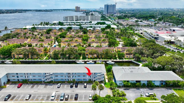 birds eye view of property featuring a water view