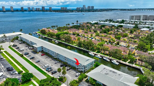 bird's eye view with a water view