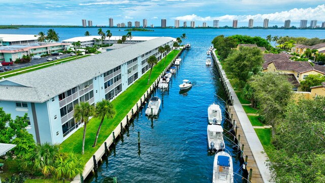 drone / aerial view with a water view