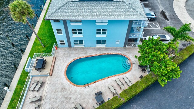 view of swimming pool with a patio