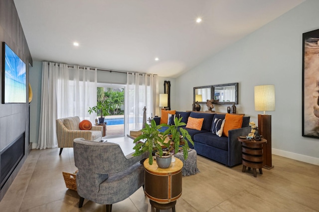 living area featuring recessed lighting, a large fireplace, lofted ceiling, and baseboards