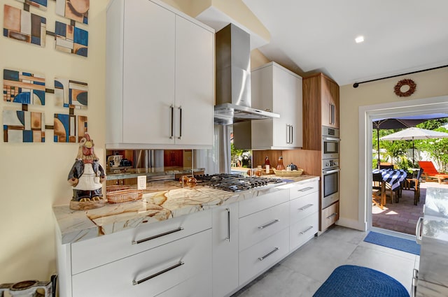 2951 San Remo Way, Delray Beach, FL 33445 - kitchen featuring wall chimney exhaust hood, stainless steel gas stovetop, plenty of natural light, and light countertops