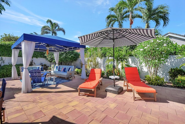 2951 San Remo Way, Delray Beach, FL 33445 - fenced backyard with a gazebo, an outdoor living space, and a patio area