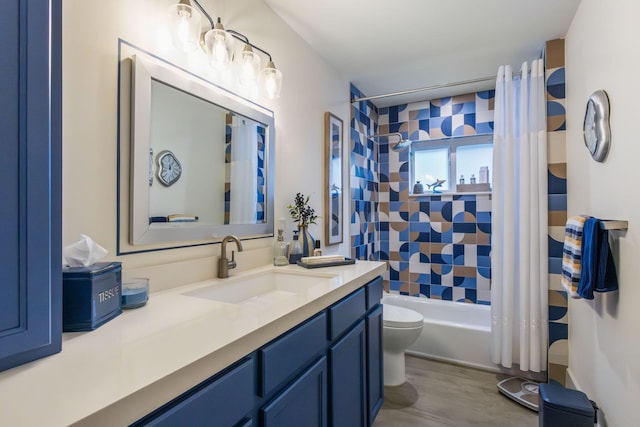 full bathroom with shower / bath combo with shower curtain, toilet, and vanity