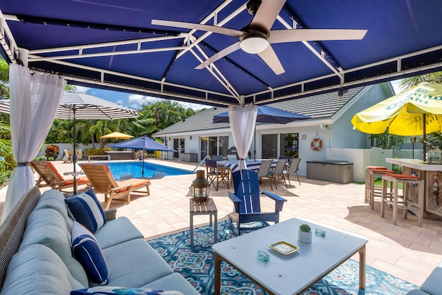 2951 San Remo Way, Delray Beach, FL 33445 - view of patio / terrace with an outdoor living space, outdoor dining area, and ceiling fan