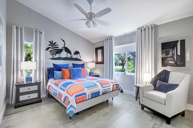 2951 San Remo Way, Delray Beach, FL 33445 - bedroom featuring multiple windows, baseboards, finished concrete flooring, and a ceiling fan