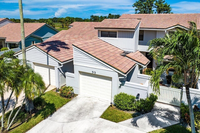 view of front of property with a garage