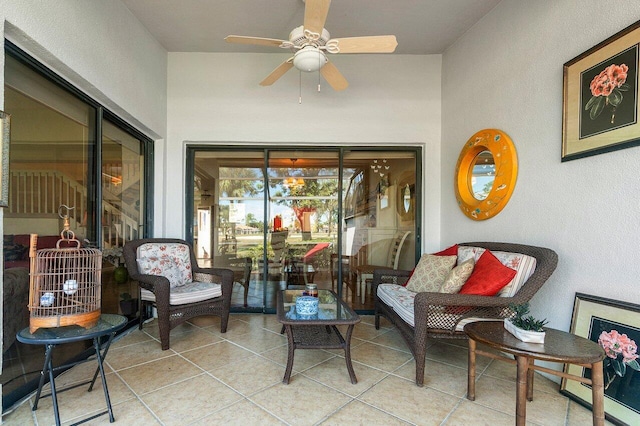 interior space with ceiling fan and light tile patterned flooring