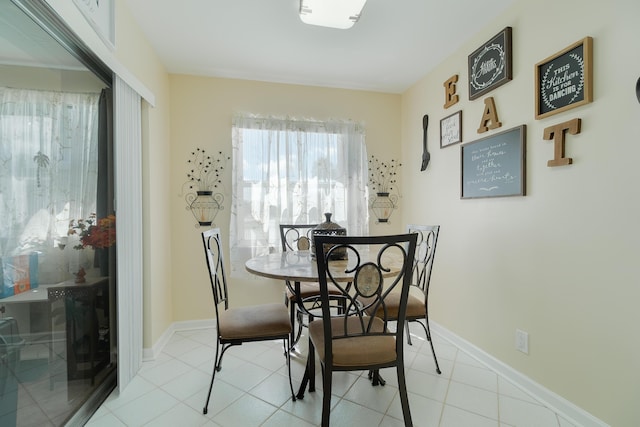 dining room featuring light tile patterned floors