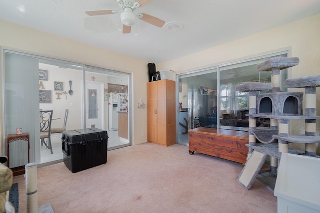 interior space featuring ceiling fan