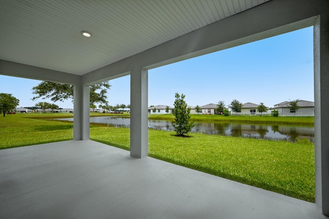 view of patio / terrace featuring a water view