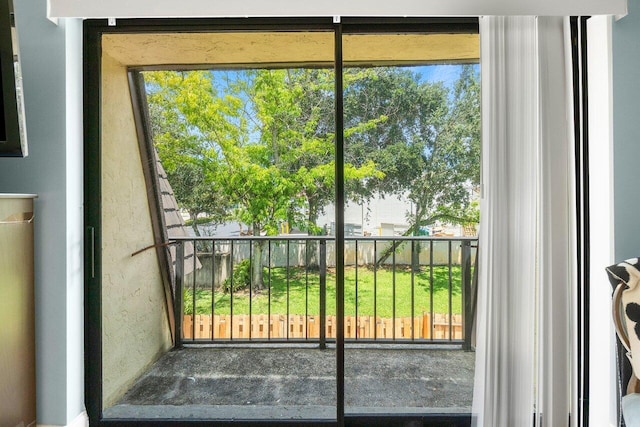 doorway to outside featuring plenty of natural light