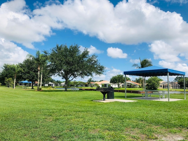 surrounding community featuring a gazebo and a yard