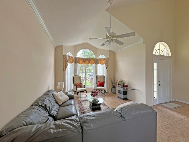 living room with crown molding, vaulted ceiling, ceiling fan, and light hardwood / wood-style flooring