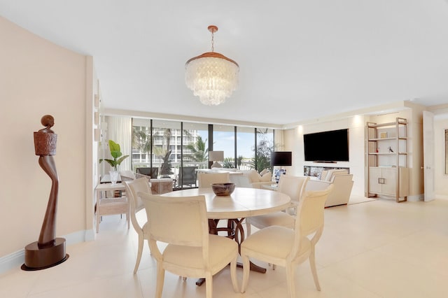 dining space with a notable chandelier