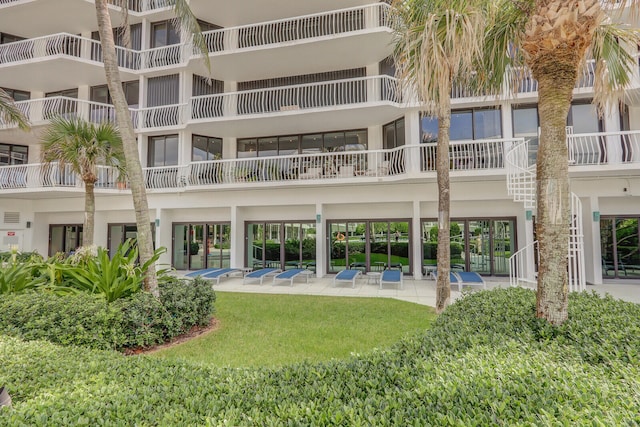 exterior space featuring a balcony and a patio area