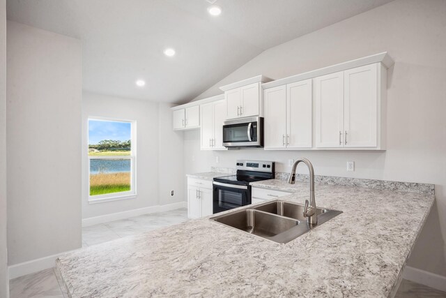 washroom featuring washer hookup, light tile patterned flooring, a textured ceiling, and electric panel