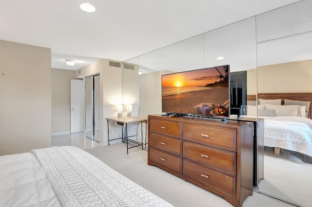 bedroom with light carpet