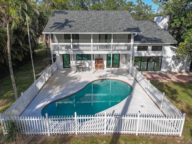 view of swimming pool featuring a patio area, a fenced in pool, and a fenced backyard