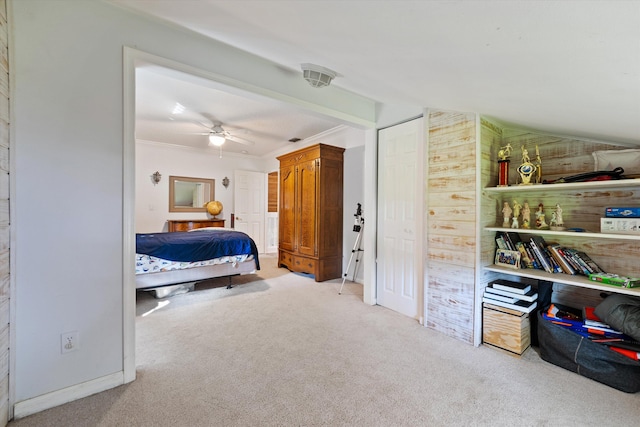 bedroom featuring light carpet
