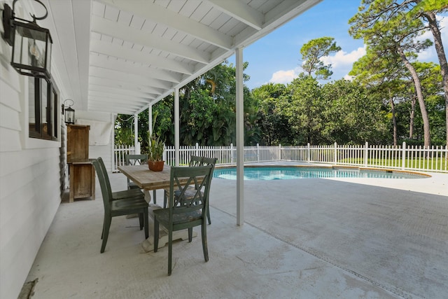 view of swimming pool with a patio area